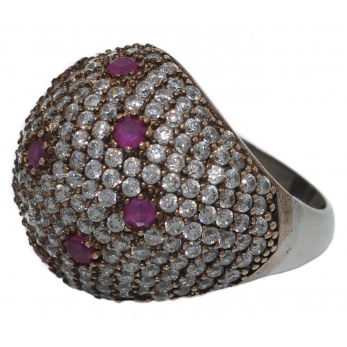 Silver ring round with red crystal dots and zircons