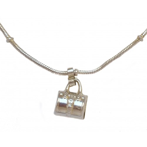 Silver bracelet with pendant charm bag