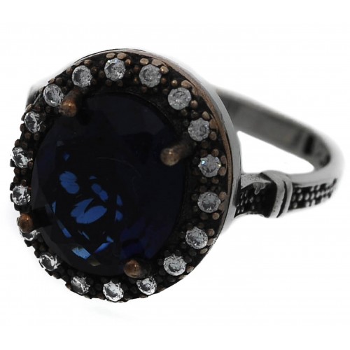 Ring round silver and blue sapphire and zircons