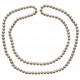 Collar largo de perlas de Rio y broche decorativo