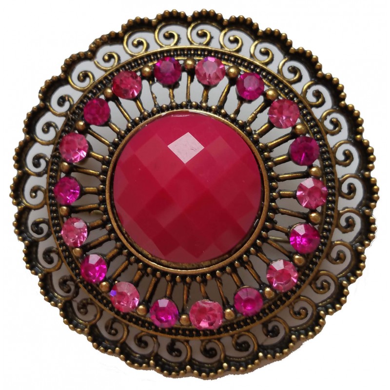 Round brooch in gold metal and resin stone